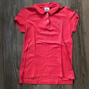 Lacoste women’s polo shirt. Color: salmon. Size M
